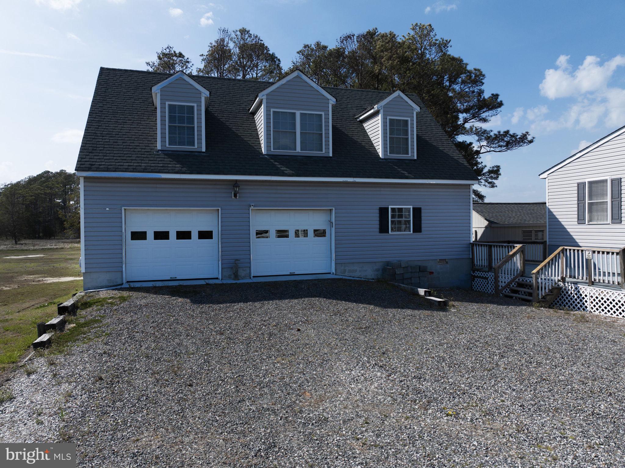 1887 Point Breeze Road Hudgins, VA 23076 - Photo 17 of 77 a house that has a lot of windows on it