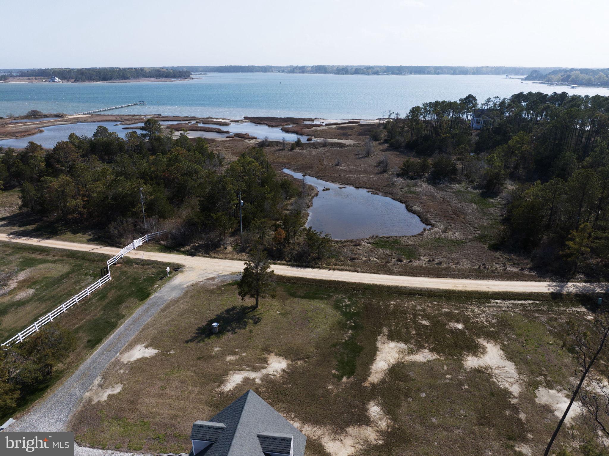 1887 Point Breeze Road Hudgins, VA 23076 - Photo 42 of 77 a view of a lake in middle of the town