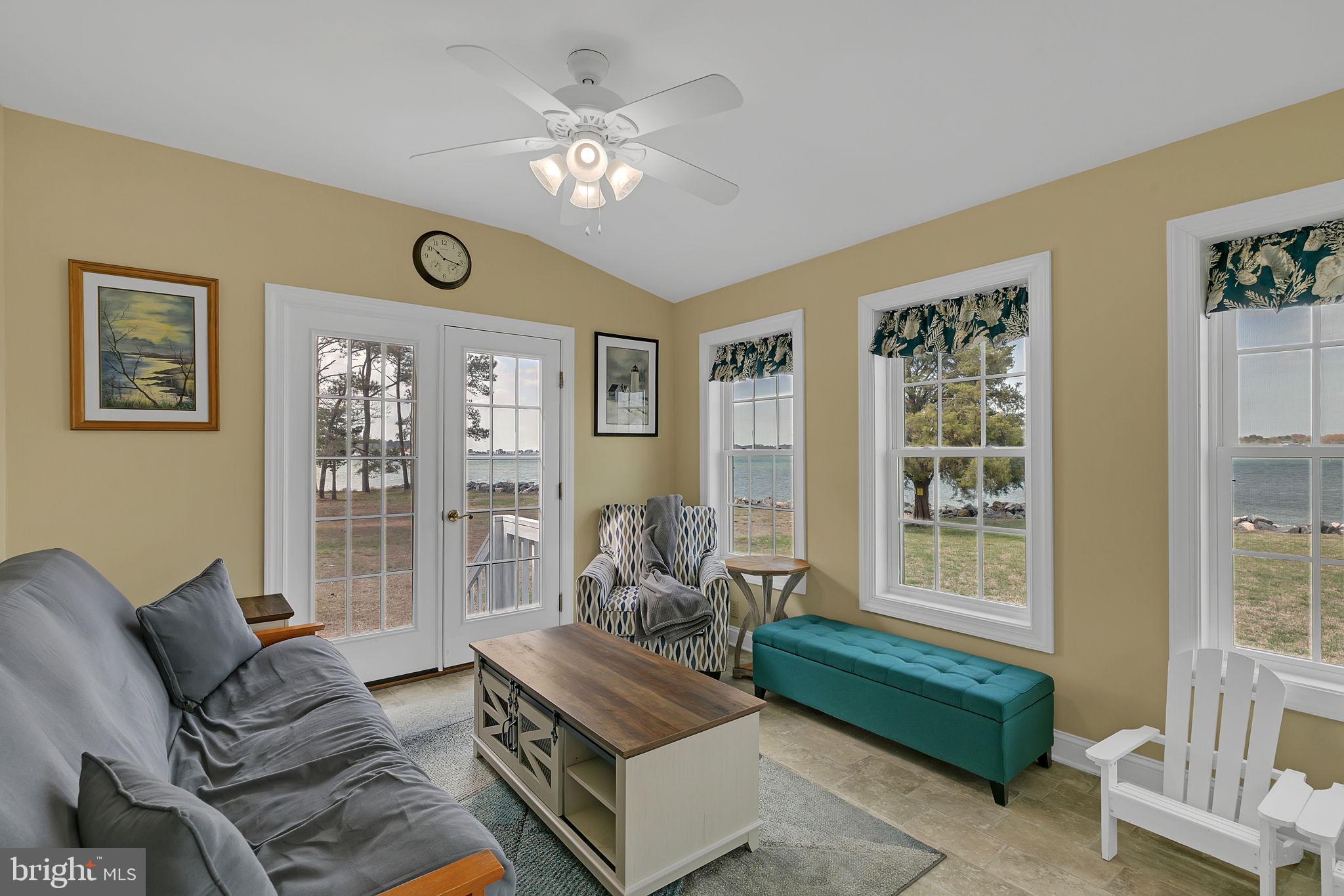 1887 Point Breeze Road Hudgins, VA 23076 - Photo 54 of 77 a living room with furniture and a large window
