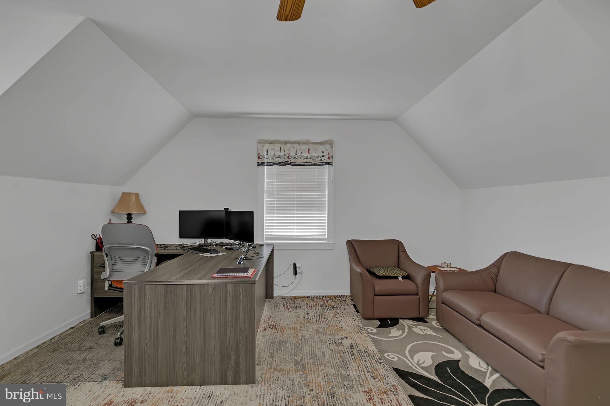 1887 Point Breeze Road Hudgins, VA 23076 - Photo 75 of 77 a living room with furniture and a flat screen tv