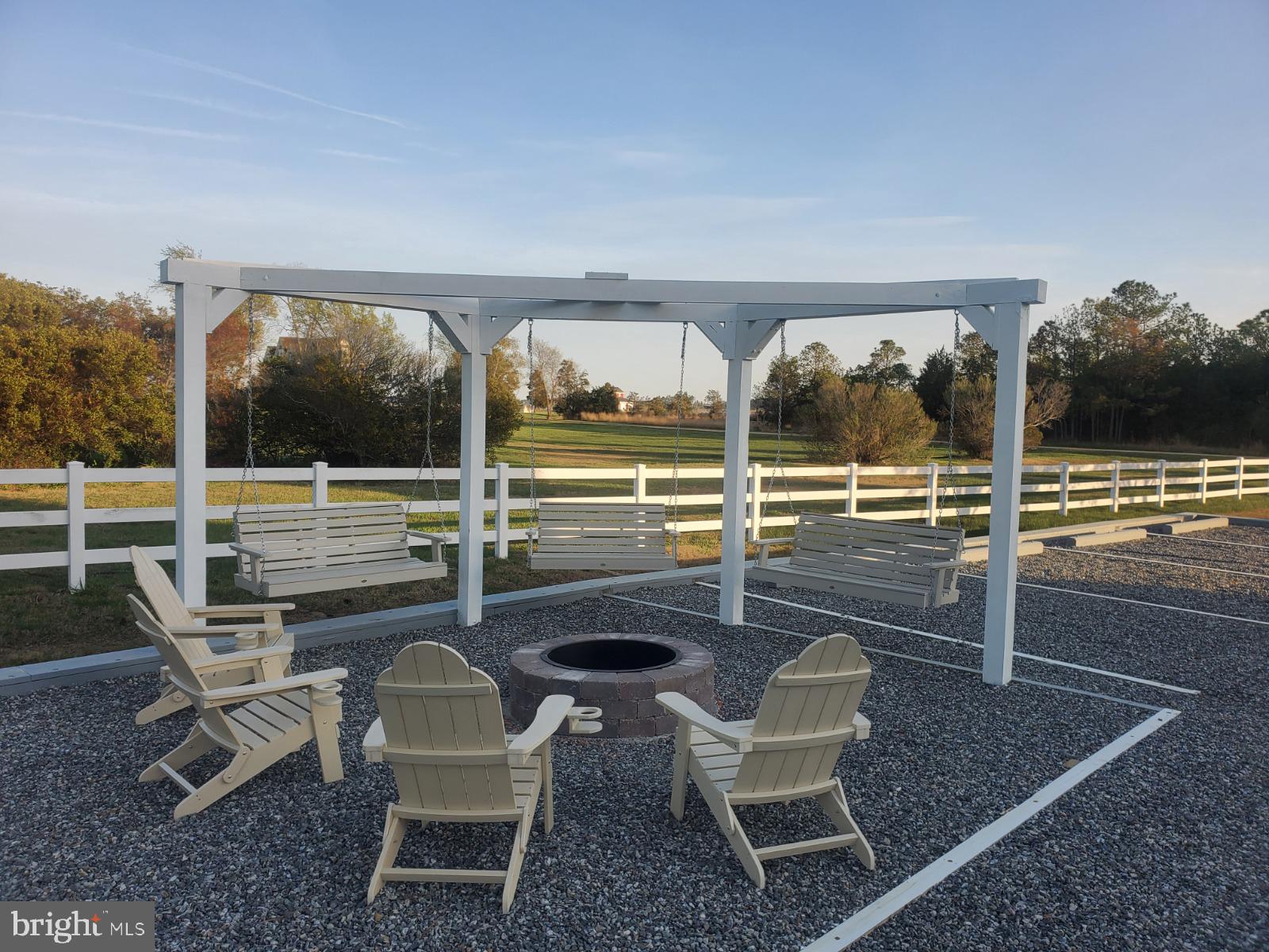 1887 Point Breeze Road Hudgins, VA 23076 - Photo 8 of 77 a view of a chairs and table in the patio