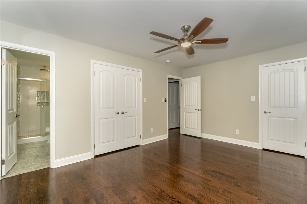 720 Dartmouth Road Raleigh, NC 27609 - Photo 17 of 25 Master Bedroom with Gorgeous Hardwood Floors and Double Closets. Master Bedroom