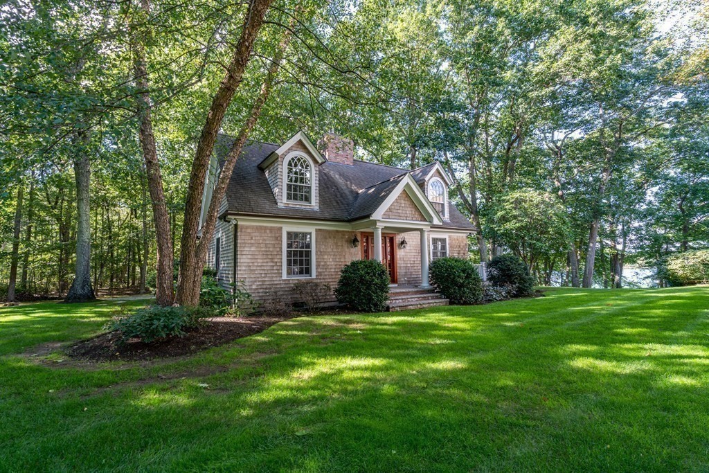 137 Forest Street Sherborn, MA 01770 - Photo 34 of 38 a front view of a house with a yard