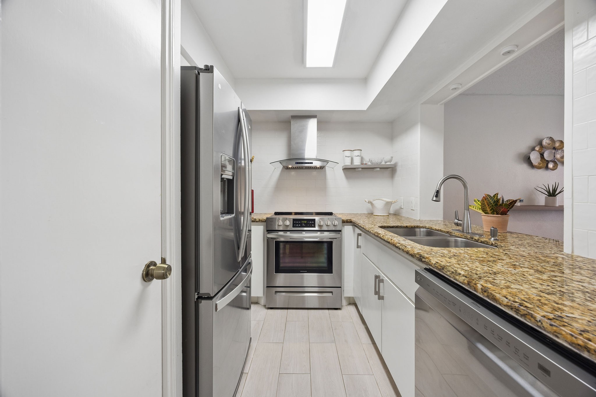 6456 Bayou Glen Road Houston, TX 77057 - Photo 6 of 11 Granite counters, stainless steel appliances, and modern finishes throughout.