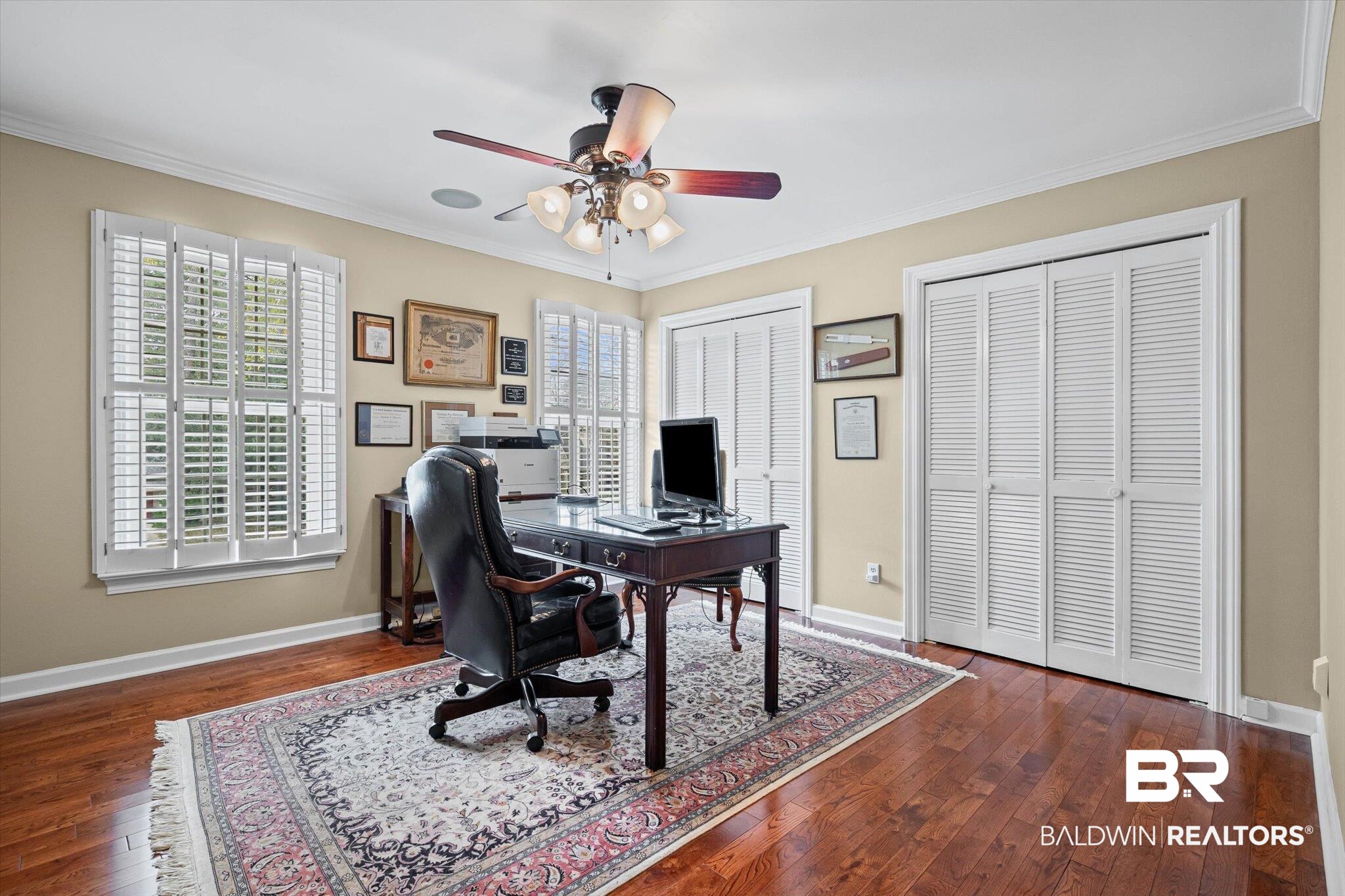1517 Ridgeland Road East Mobile, AL 36695 - Photo 29 of 39 Bedroom with crown molding, dark wood-style floors, and ceiling fan
