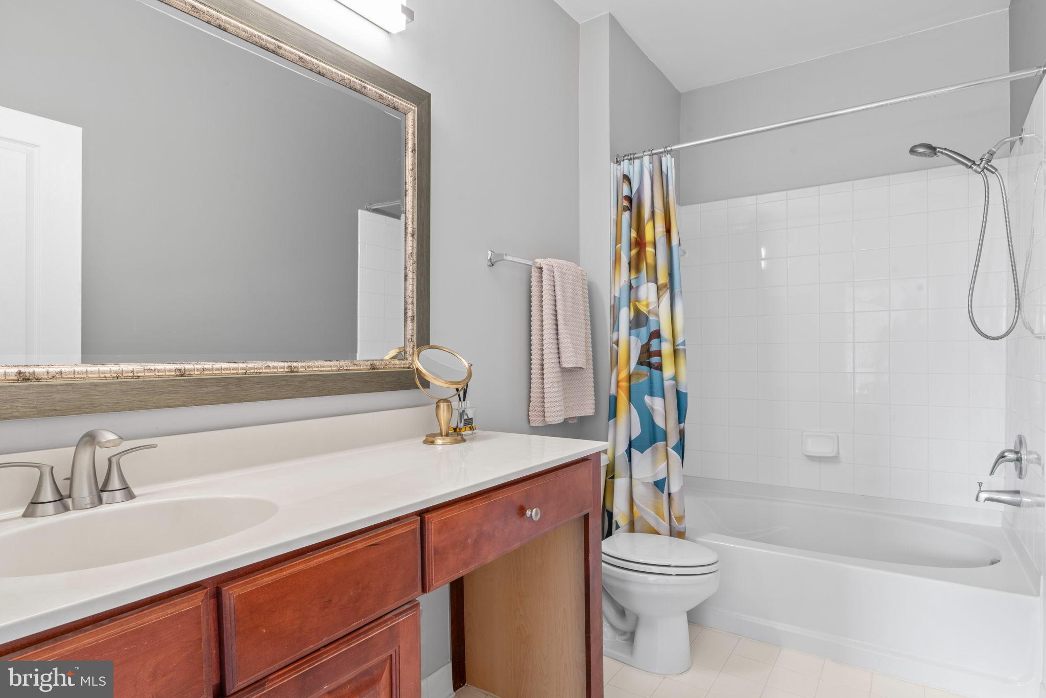 12001 Market Street, Unit 319 Reston, VA 20190 - Photo 23 of 37 Modern bathroom with stylish accents.