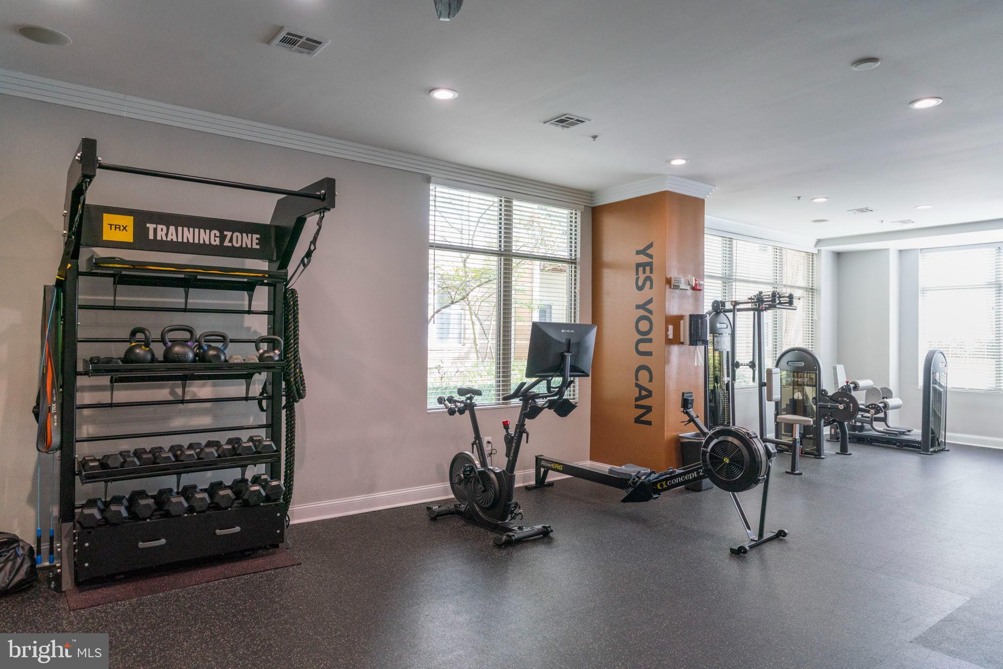12001 Market Street, Unit 319 Reston, VA 20190 - Photo 30 of 37 Modern fitness space with motivational vibes.