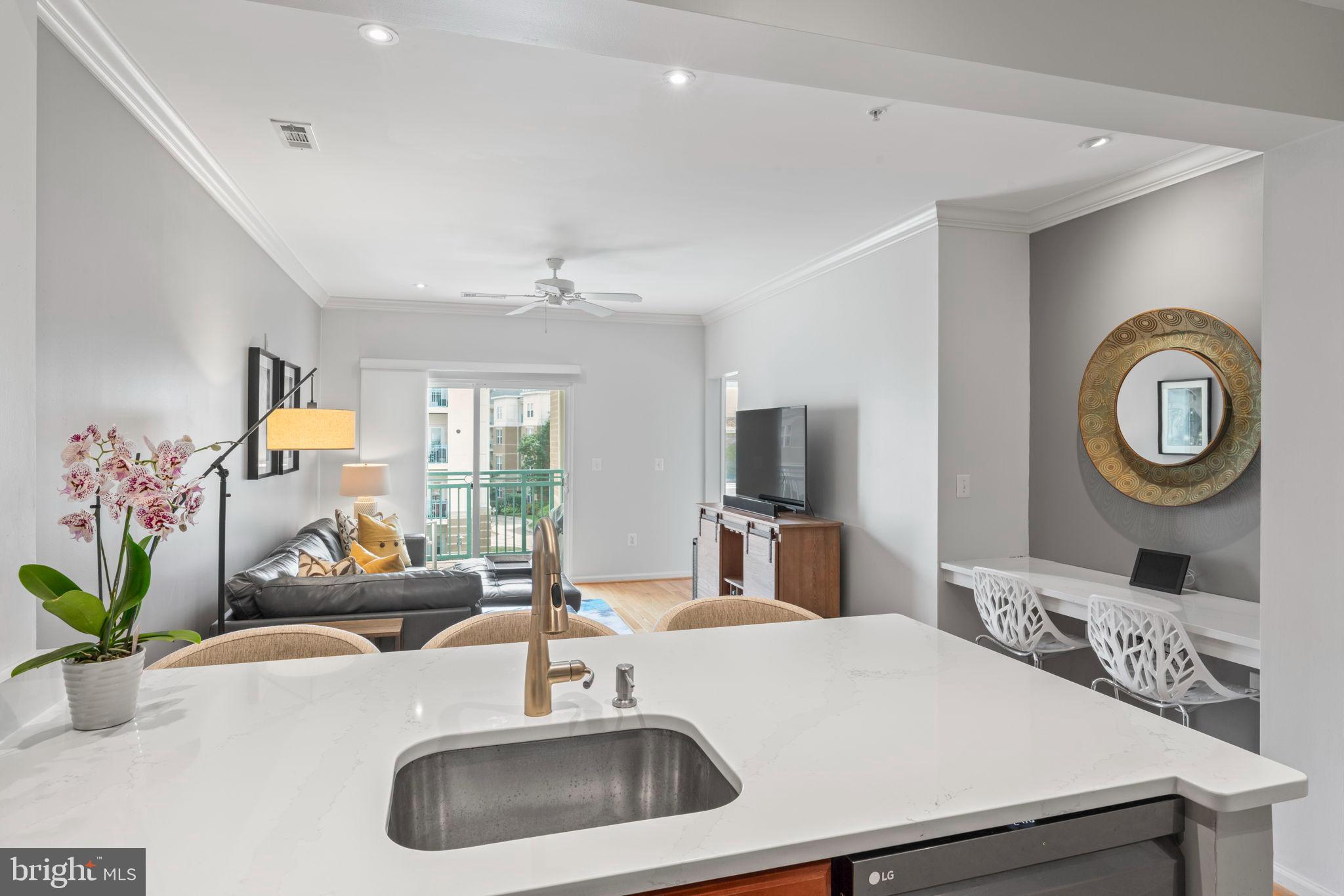 12001 Market Street, Unit 319 Reston, VA 20190 - Photo 9 of 37 Modern elegance in a bright living space.