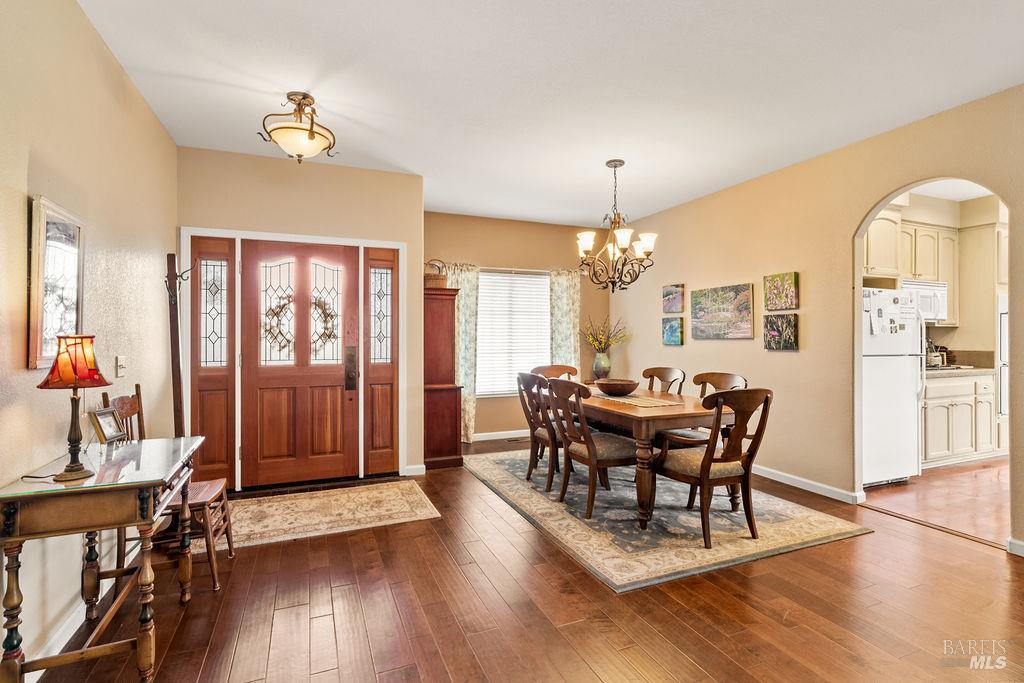 6252 Meadowstone Drive Santa Rosa, CA 95409 - Photo 19 of 33 a view of a dining room with furniture and wooden floor