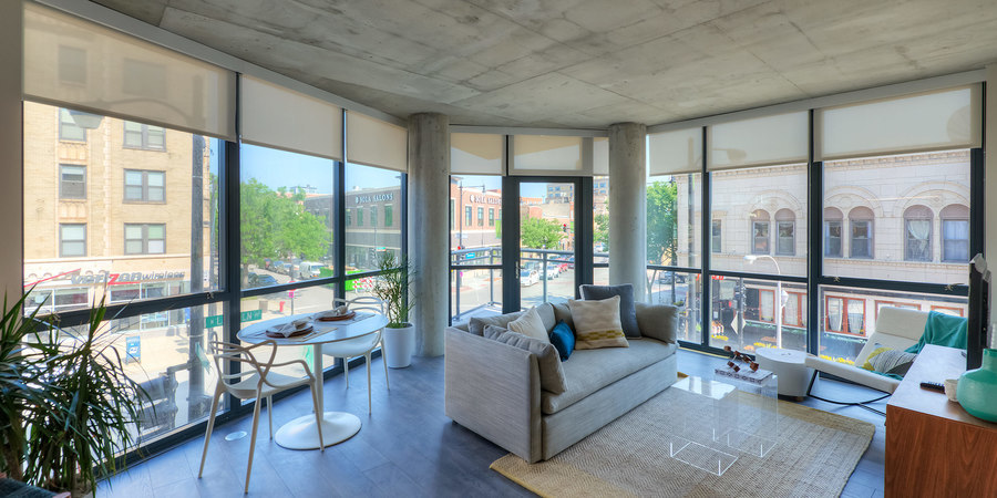 Undisclosed Address Chicago, IL 60657 - Photo 2 of 8 a living room with furniture and floor to ceiling windows