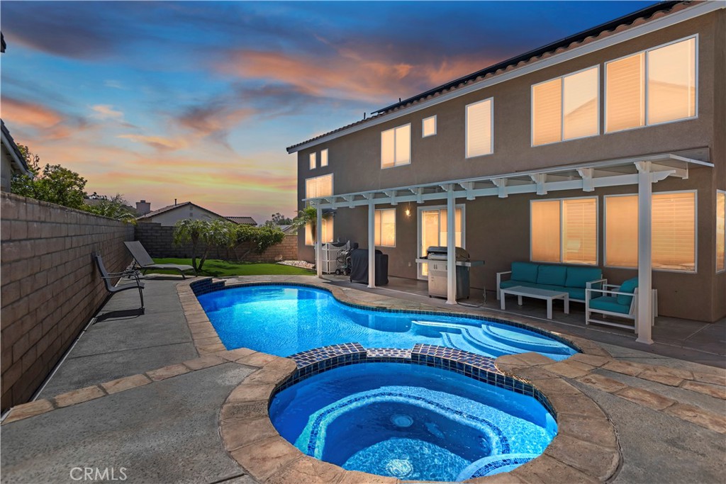 16462 Sun Summit Drive Riverside, CA 92503 - Photo 1 of 1 a swimming pool with outdoor seating yard and barbeque oven