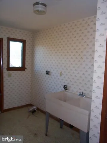 a bathroom with a sink and a bathtub