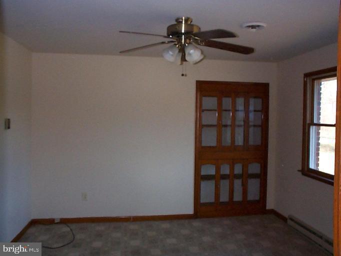 549 Burns Crossing Road Gambrills, MD 21054 - Photo 6 of 8 a view of empty room with windows