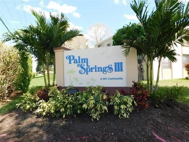 a sign on the side of a road