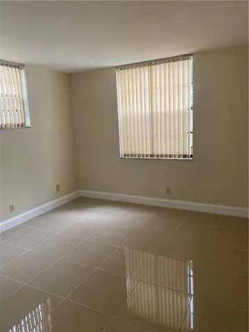 an empty room with a window