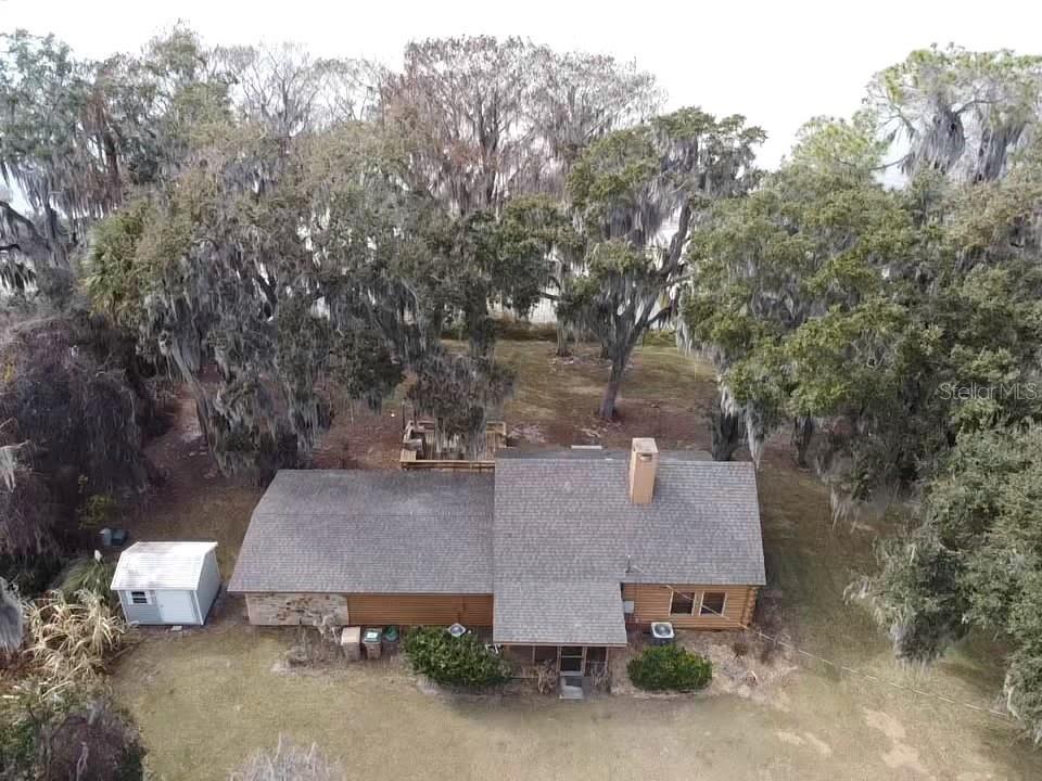 31035 Cove Road Tavares, FL 32778 - Photo 9 of 14 an aerial view of a house