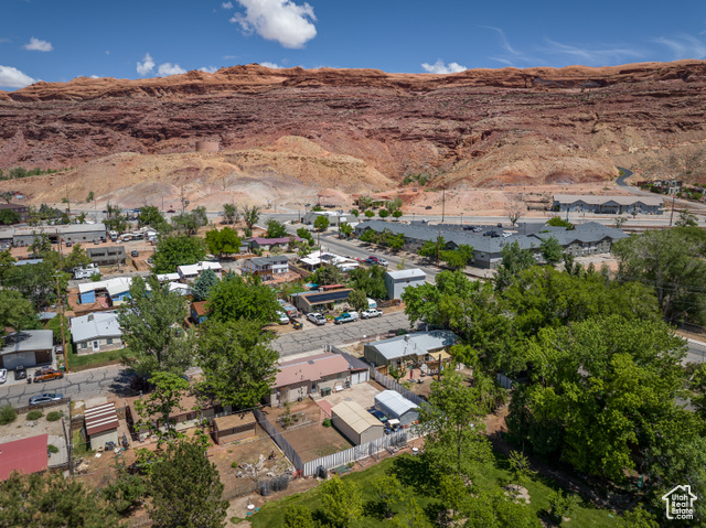 527 Palisade Drive Moab, UT 84532 - Photo 41 of 51 Aerial view of property's location with mountains and nearby suburban area