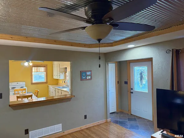 a view of a living room with a window