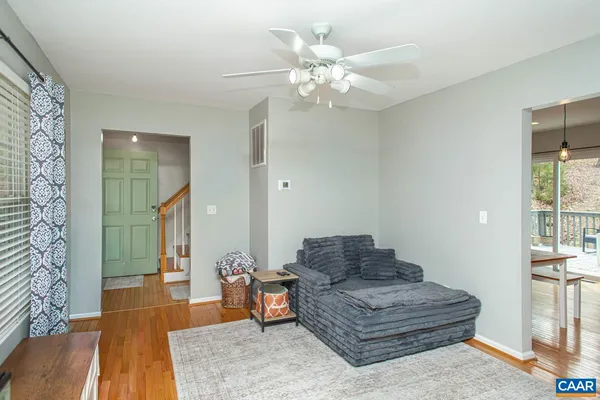 a kitchen with stainless steel appliances a stove refrigerator sink and microwave