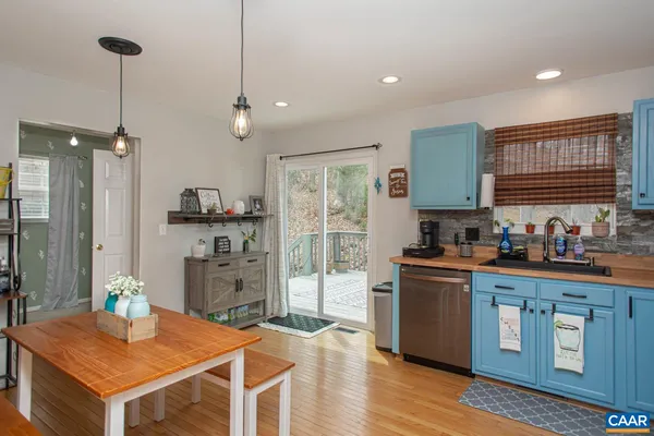 a room with furniture and a wooden floor