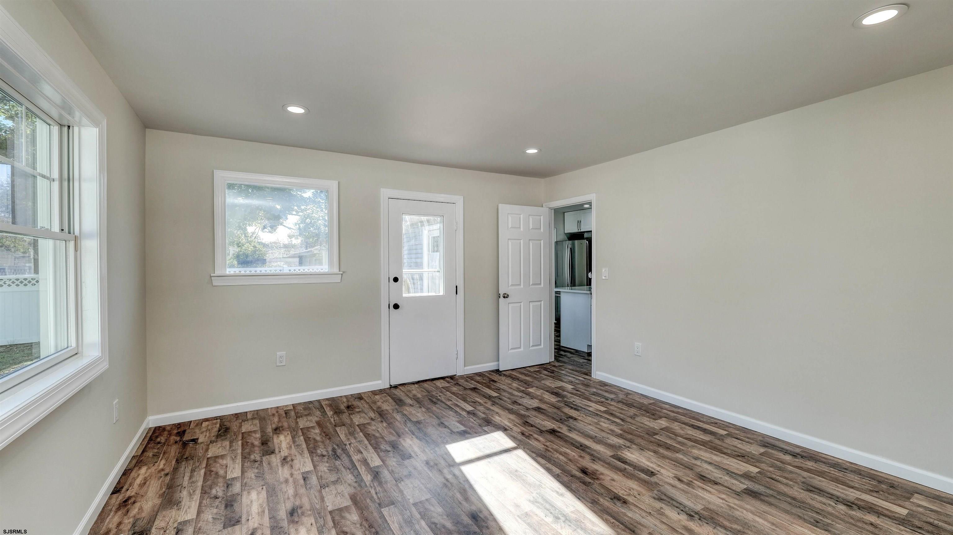 19 Merion Drive Somers Point, NJ 08244 - Photo 14 of 30 a view of hallway with window and wooden floor