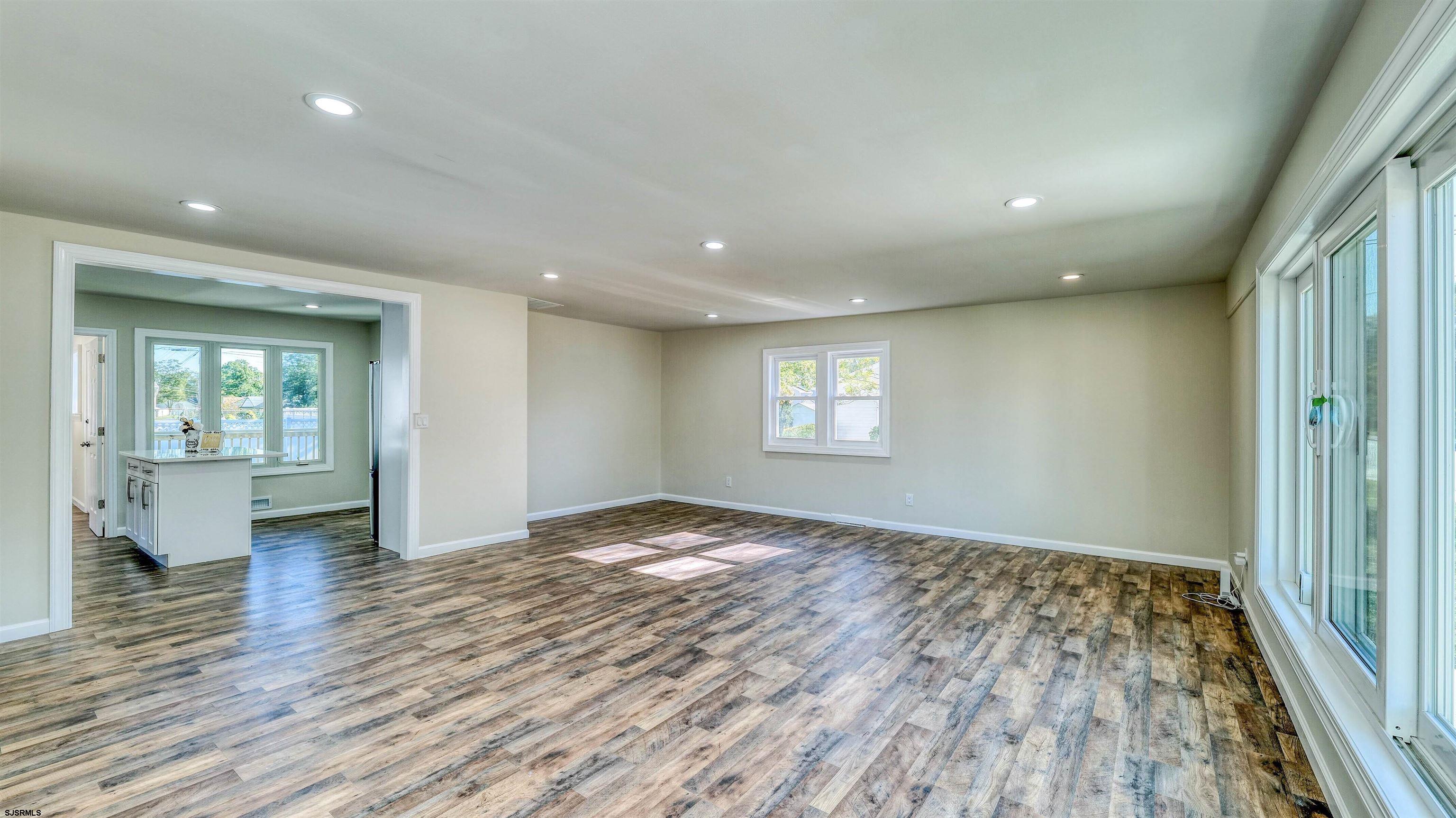 19 Merion Drive Somers Point, NJ 08244 - Photo 2 of 30 a view of empty room with wooden floor and fan