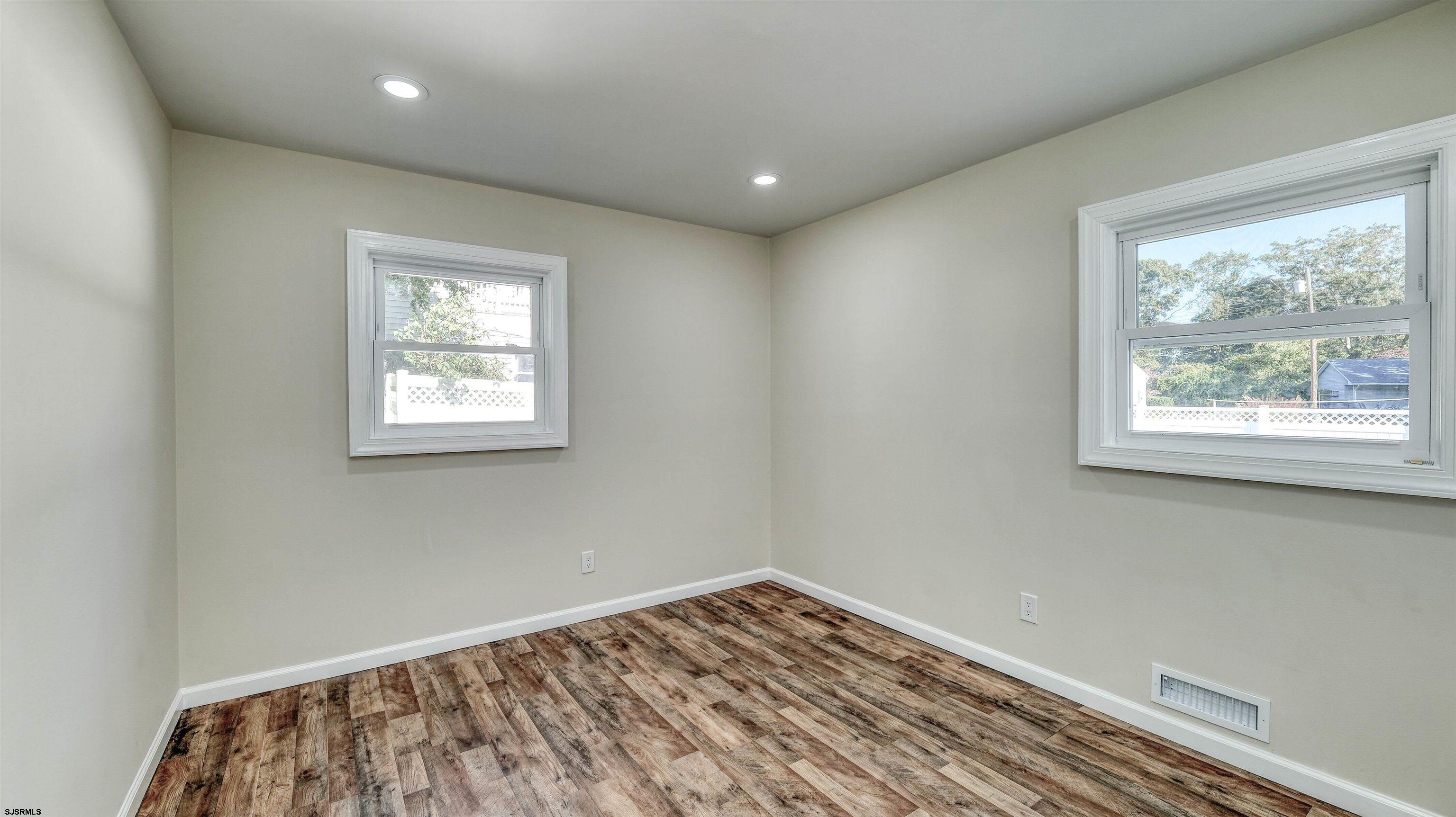 19 Merion Drive Somers Point, NJ 08244 - Photo 8 of 30 a view of room with window and wooden floor