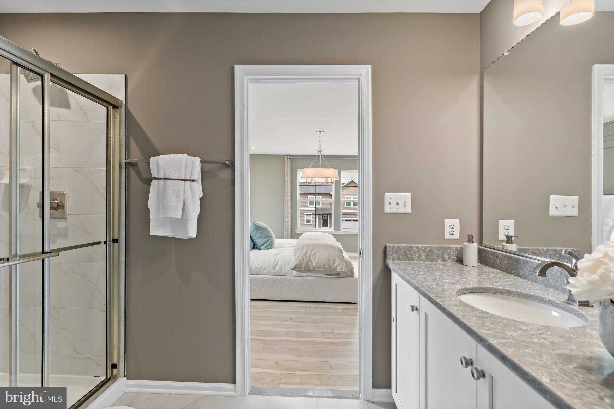541 Benjamin Road Hanover, PA 17331 - Photo 21 of 50 a bathroom with a granite countertop sink and a mirror