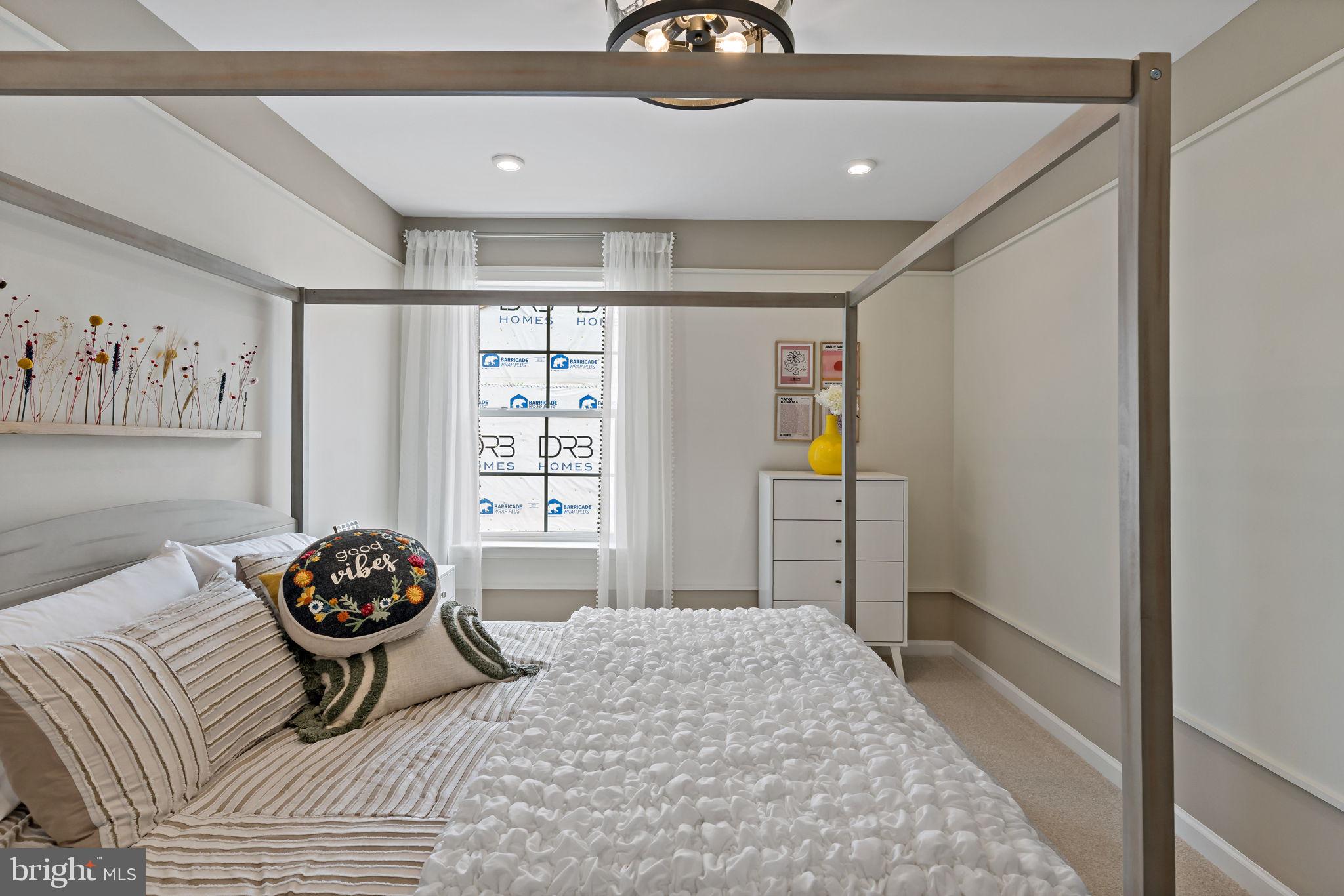 541 Benjamin Road Hanover, PA 17331 - Photo 31 of 50 a bedroom with a bed and a chandelier