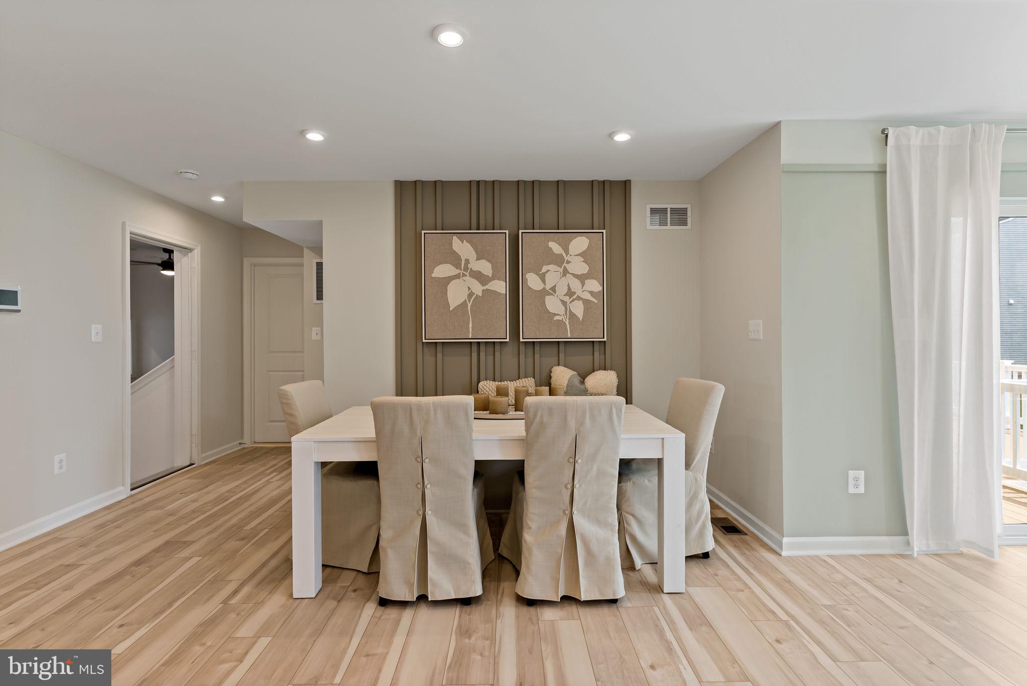 541 Benjamin Road Hanover, PA 17331 - Photo 9 of 50 a view of a dining room with furniture and wooden floor