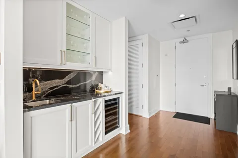 a kitchen with stainless steel appliances a stove and a refrigerator