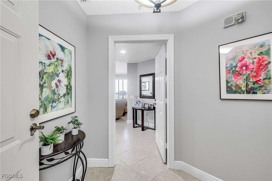 2743 First Street, Unit 1502 Fort Myers, FL 33916 - Photo 4 of 35 a view of a entryway with furniture and a potted plant