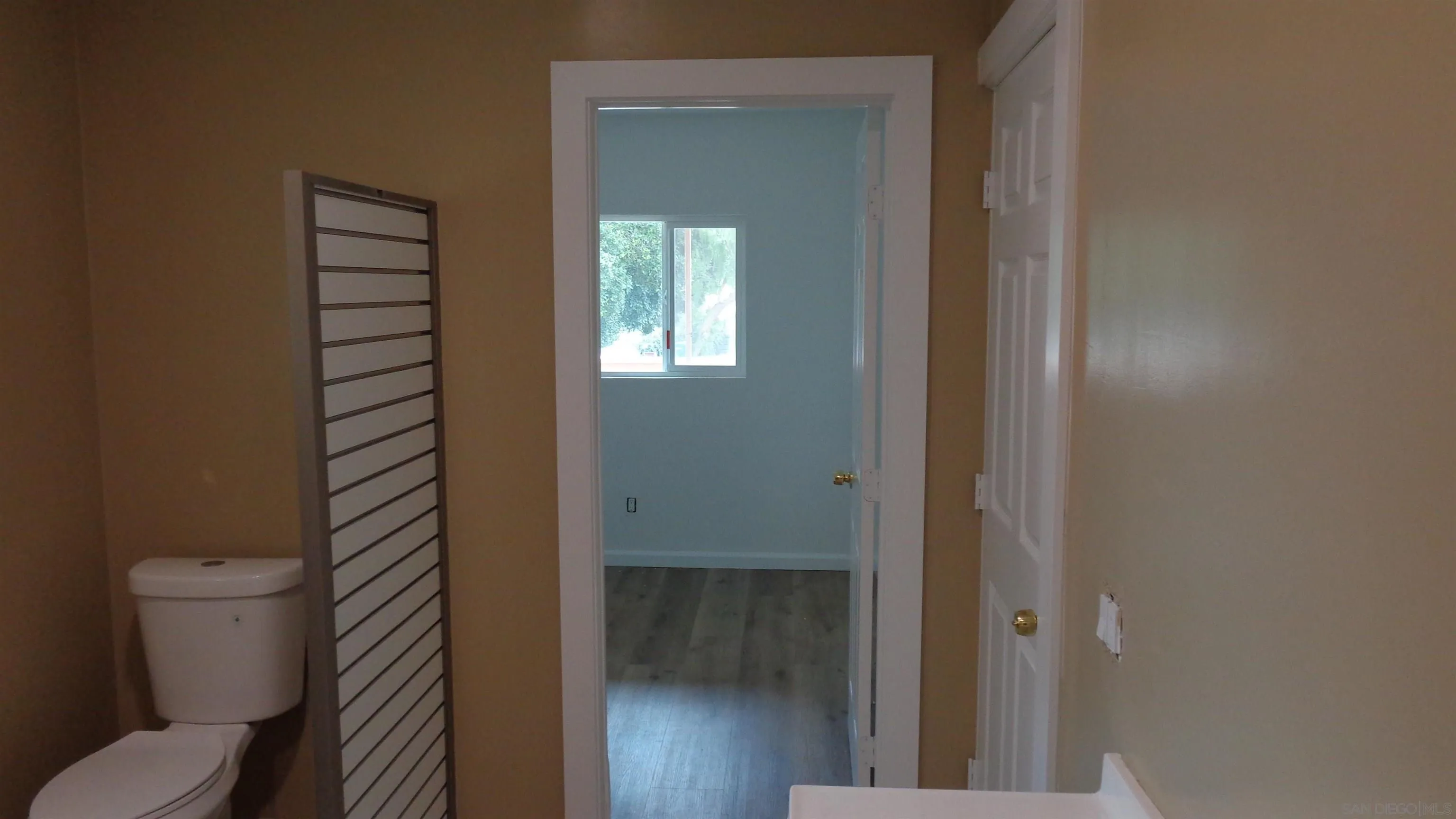29660 Wilkes Road Valley Center, CA 92082 - Photo 7 of 16 a bathroom with a toilet and a shower