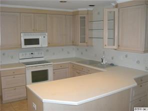 2900 Colony Road Charlotte, NC 28211 - Photo 4 of 8 a kitchen with a sink cabinets and appliances