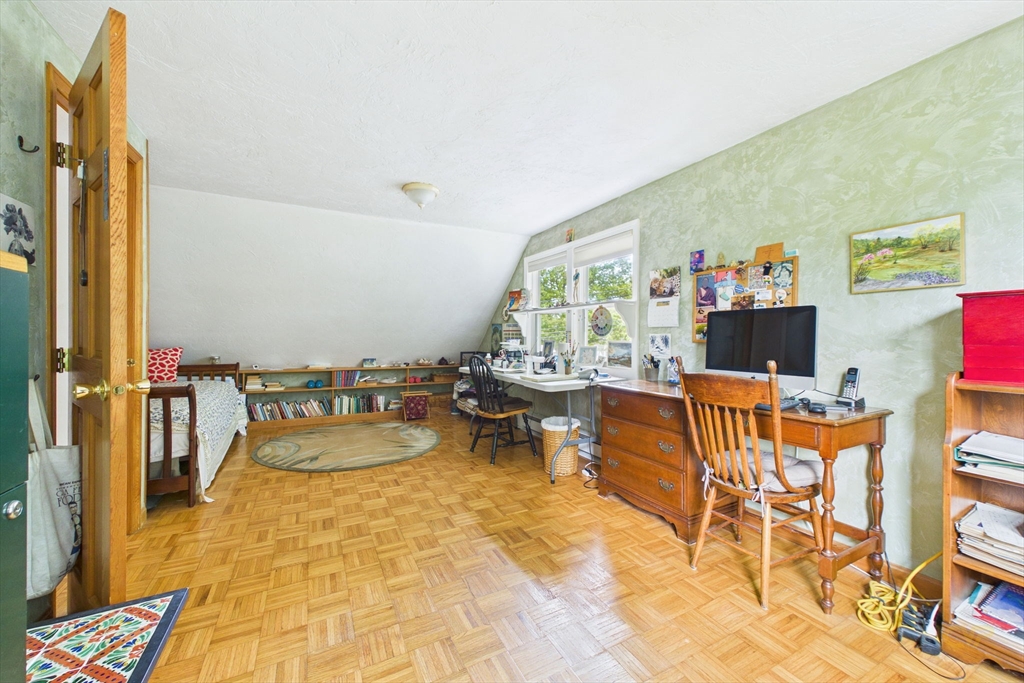 70 Neponset Street Canton, MA 02021 - Photo 25 of 39 a living room with furniture and a flat screen tv