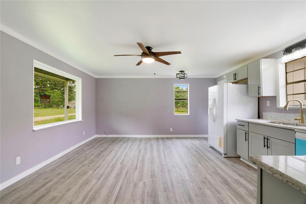 71 Pr 45035 Powderly Tx 75473 Powderly, TX 75473 - Photo 6 of 10 a view of workspace with wooden floor and a window