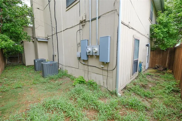 a kitchen with granite countertop cabinets stainless steel appliances and sink