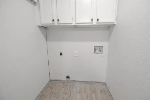 a view of a kitchen with a sink