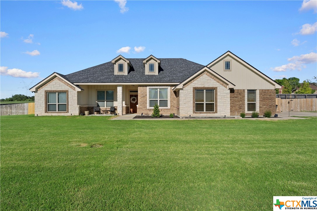 400 County Road 4773 Kempner, TX 76539 - Photo 1 of 1 a front view of a house with a garden and porch