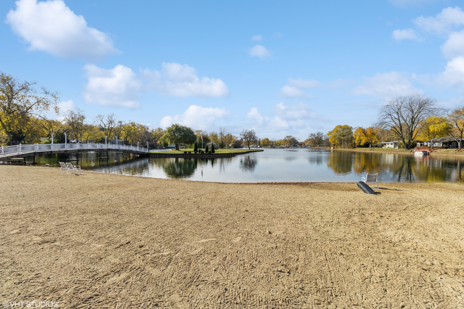292 Bayview Road Elgin, IL 60123 - Photo 17 of 20 a view of a lake with houses in the back