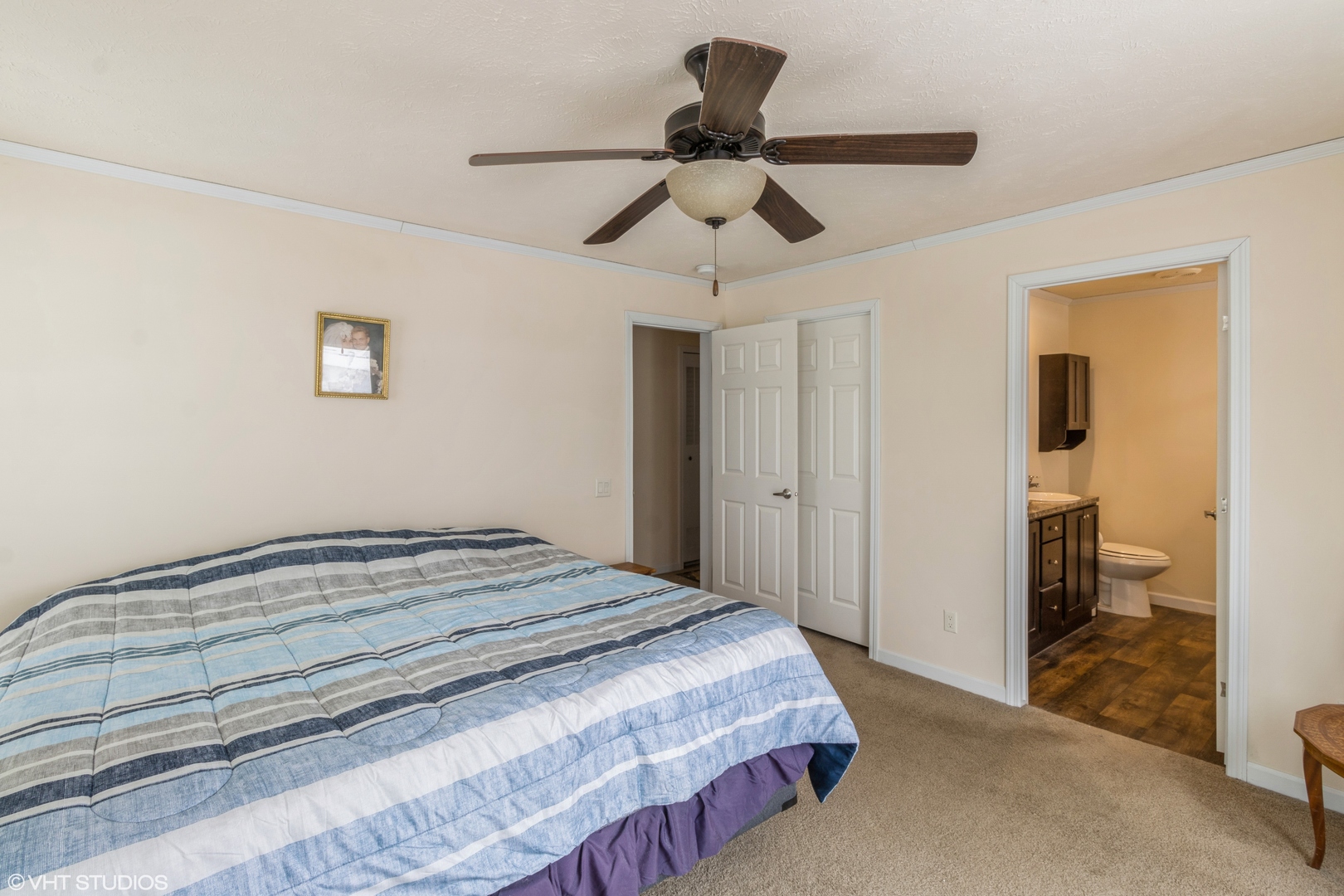 292 Bayview Road Elgin, IL 60123 - Photo 9 of 20 a bedroom with a bed and a ceiling fan