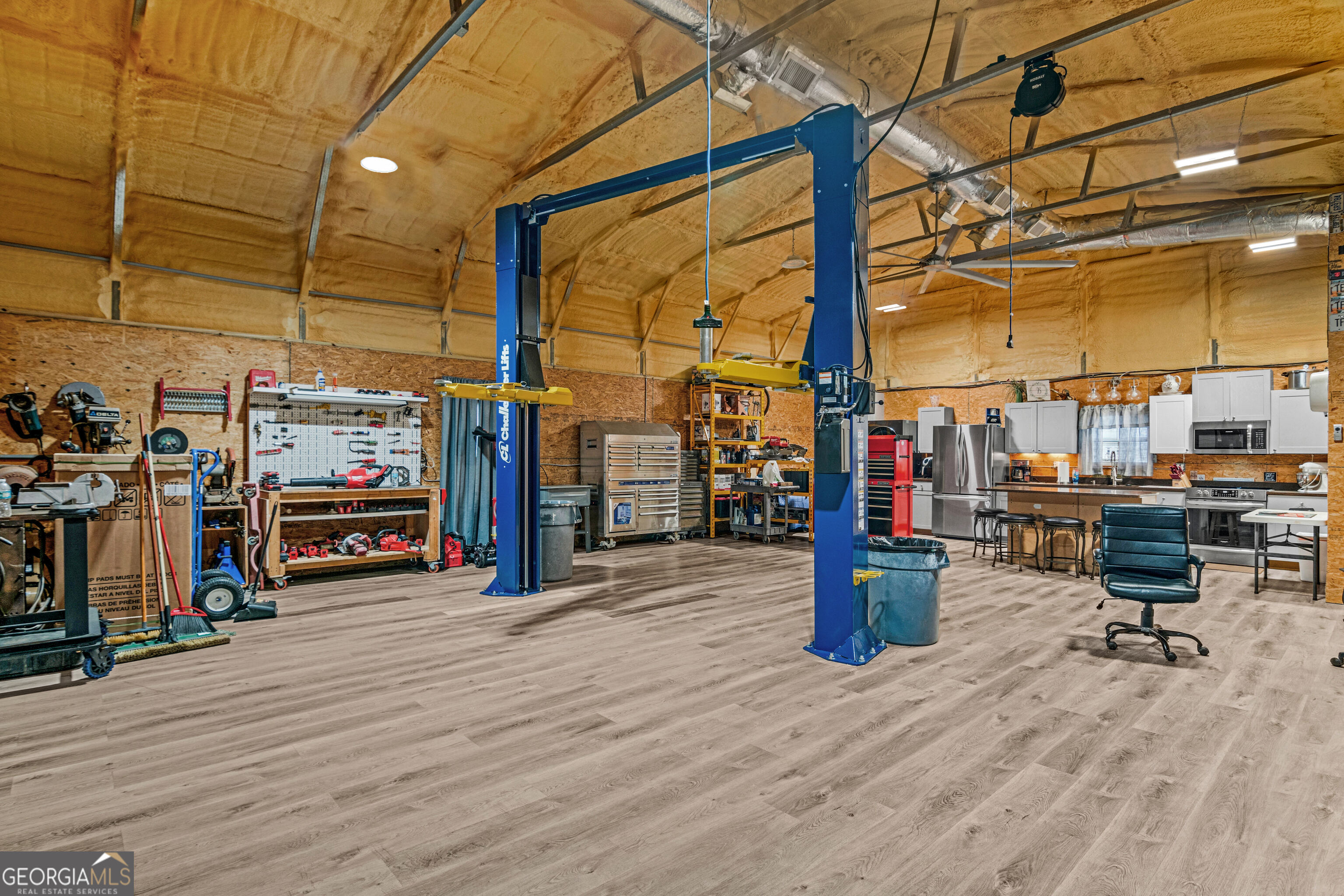 897 Empire Road Jesup, GA 31545 - Photo 35 of 40 GARAGE MANCAVE WIH LVP FLOORS AND FULL KITCHEN AND BATH