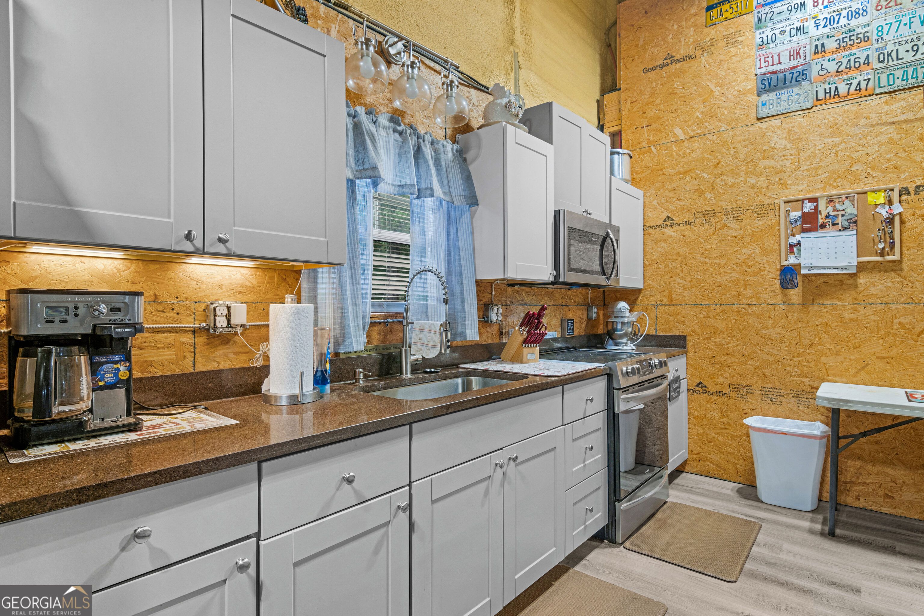 897 Empire Road Jesup, GA 31545 - Photo 37 of 40 GARAGE MANCAVE KITCHEN