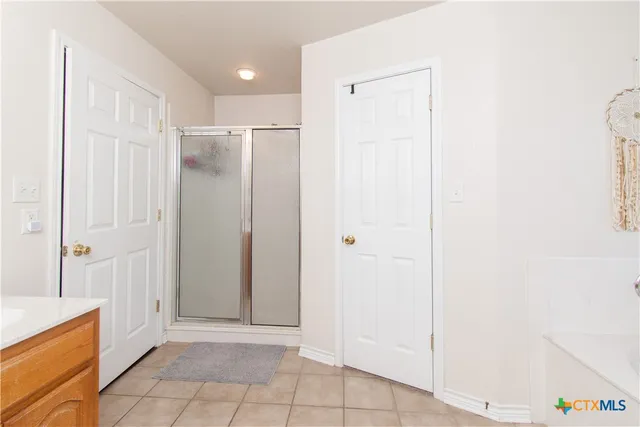 a view of a hallway with closet area