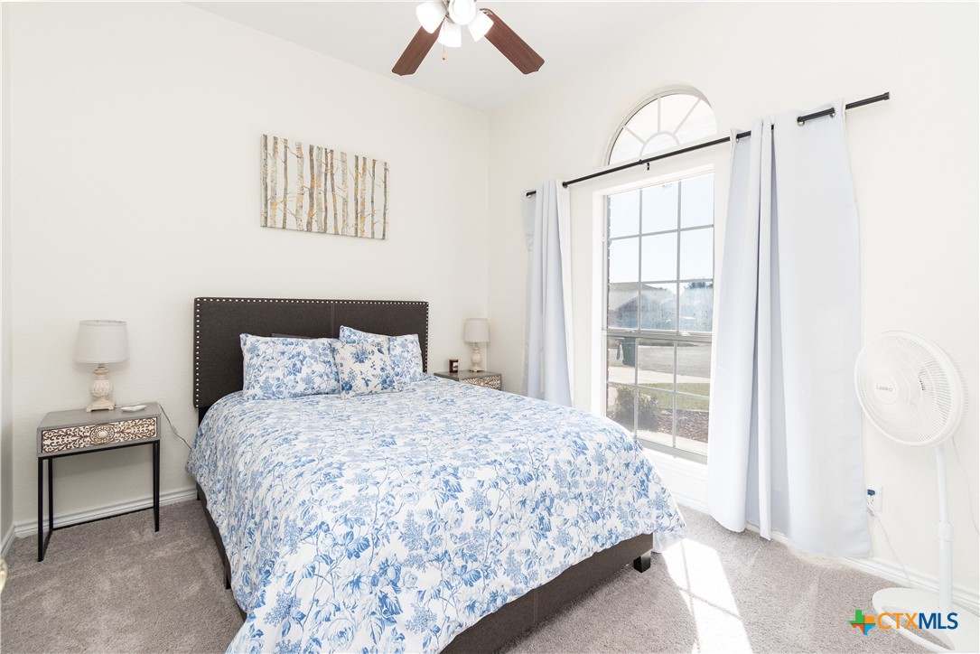 103 Corral Court Harker Heights, TX 76548 - Photo 17 of 27 a bedroom with a bed and a window