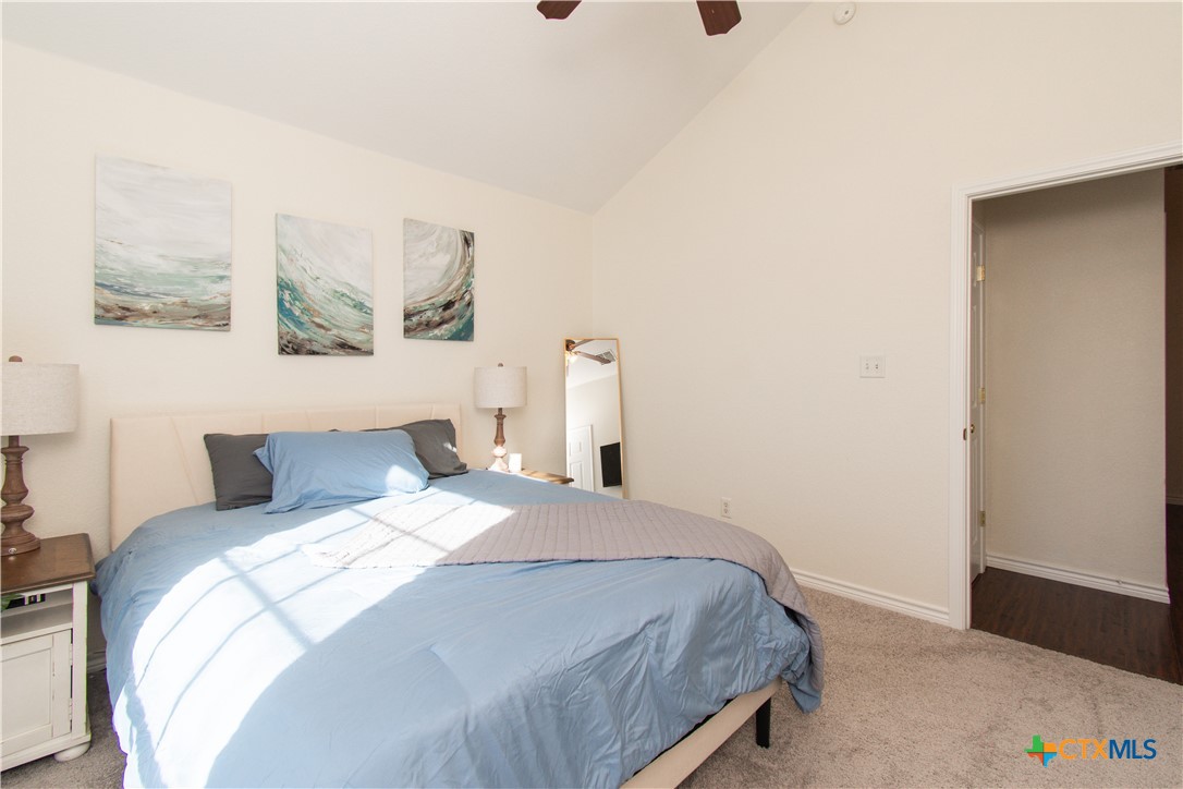103 Corral Court Harker Heights, TX 76548 - Photo 21 of 27 a bedroom with a bed and painting on the wall