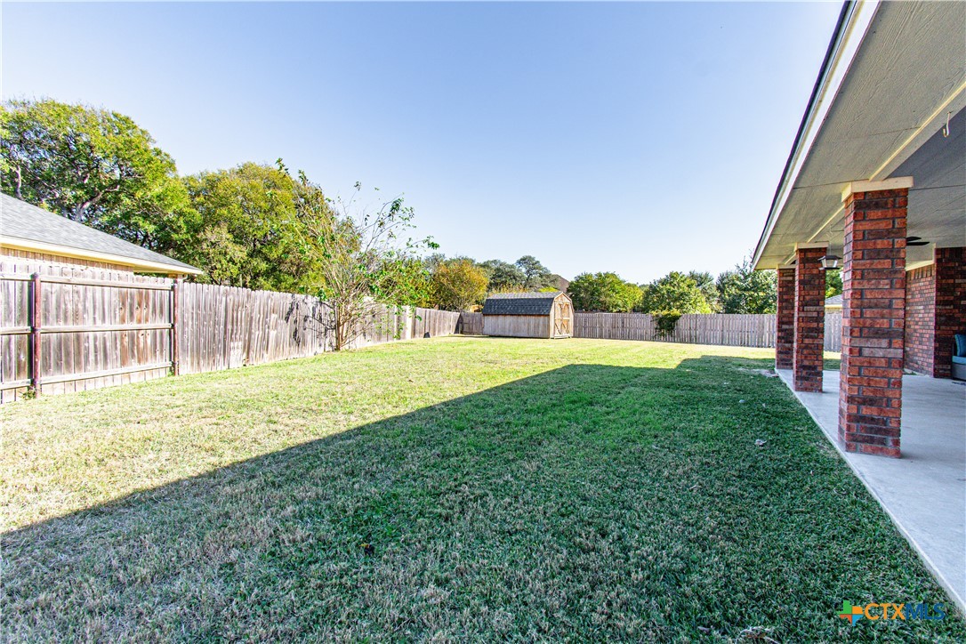 103 Corral Court Harker Heights, TX 76548 - Photo 27 of 27 a view of a backyard with a garden and plants