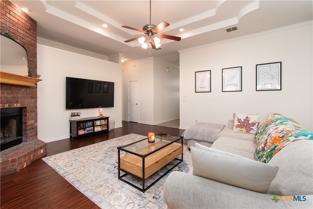 103 Corral Court Harker Heights, TX 76548 - Photo 4 of 27 a living room with furniture and a flat screen tv