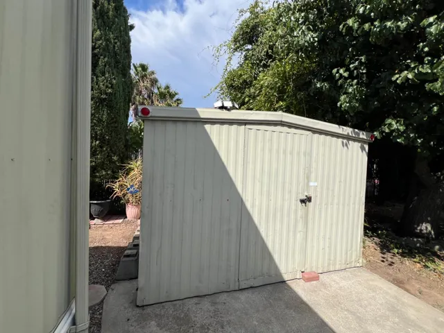 a view of balcony and tree