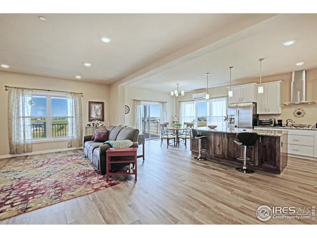 a workspace with furniture and wooden floor
